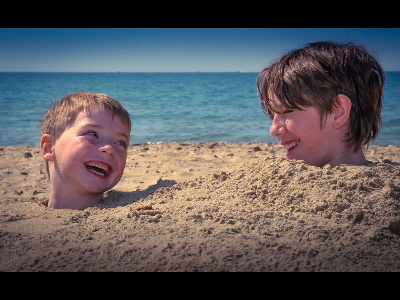 3rd Place - James Puddicombe - Jude and Ben in the beach
